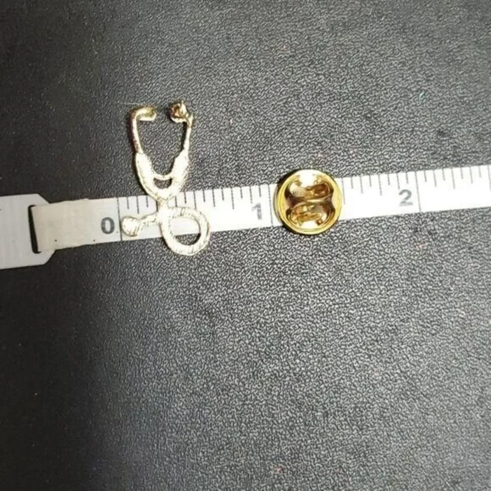Gold tone stethoscope pin
